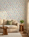 Garden Trellis removable wallpaper with colorful botanical motifs in cozy living room setting