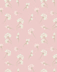 Self-adhesive, removable wallpaper featuring a ditsy pattern of pink and white flowers