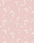 Self-adhesive, removable wallpaper featuring a ditsy pattern of pink and white flowers