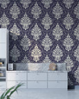 Navy and silver Gentlebotan damask wallpaper in modern kitchen with white cabinetry