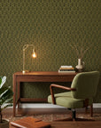Gilded Fortress dark green and gold geometric art deco wallpaper adding character to a cozy bedroom