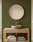Gilded Fortress dark green and gold geometric art deco wallpaper as a feature wall in a bright home office