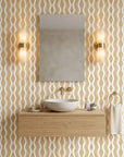 Gilded Rain ochre geometric peel and stick wallpaper creating ambiance in a serene bathroom