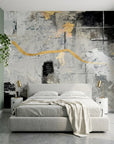 Gilded River grey and gold abstract expressionist wallpaper in a warm and inviting living room