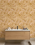 Gilded Tapestry warm gold paisley floral wallpaper as a feature wall in a bright home office