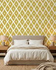 Gilded Temple golden geometric peel and stick wallpaper adding character to a cozy bedroom