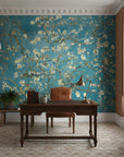 Teal and cream Golden Blossoms peel and stick wallpaper featuring almond tree branches in elegant home office