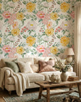 Golden Blush yellow and pink watercolor peony floral wallpaper in a warm and inviting living room