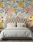 Golden Blush yellow and pink watercolor peony floral wallpaper adding character to a cozy bedroom