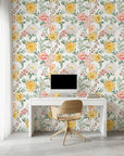 Golden Blush yellow and pink watercolor peony floral wallpaper as a feature wall in a bright home office