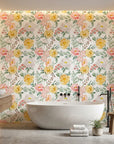 Golden Blush yellow and pink watercolor peony floral wallpaper creating ambiance in a serene bathroom