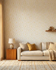 Cream and gold geometric diamond pattern Golden Echo wallpaper in modern living room with natural light