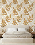 Linen textured Golden Fern wallpaper detail showing warm amber botanical leaves on cream background