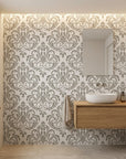 Golden Leaf Waltz taupe grey damask wallpaper creating ambiance in a serene bathroom