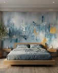 Golden Mist blue and gold abstract wallpaper in a warm and inviting living room