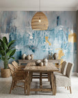 Golden Mist blue and gold abstract wallpaper as a feature wall in a bright home office
