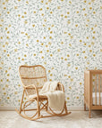 Golden Tulip Vine peel and stick wallpaper in sage green and mustard yellow adorning a serene nursery wall