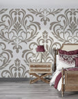 Taupe and cream Golden Leaf Waltz damask wallpaper creating an elegant bedroom accent wall
