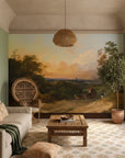 Golden hour landscape mural Grand Valley Vista wallpaper in living room with peacock chair and natural light