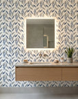 Hanging Garden blue botanical peel and stick wallpaper creating ambiance in a serene bathroom