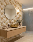 Harvest Crown neutral botanical peel and stick wallpaper creating ambiance in a serene bathroom