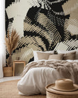 Geometric wallpaper featuring abstract hatched lines in black and beige.