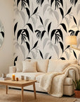Hatched Frond earthy botanical wallpaper in a warm and inviting living room