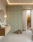 Herb & Ivory sage green botanical leaf creating ambiance in a serene bathroom