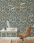 Hidden Rivers sage green and beige abstract swirl wallpaper as a feature wall in a bright home office