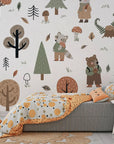 Removable wall decal featuring woodland wildlife and towering greenery for a child's bedroom - Hidden Glade