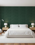 Hidden Understory dark green botanical wallpaper adding character to a cozy bedroom