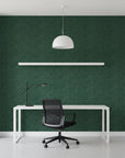 Hidden Understory dark green botanical wallpaper as a feature wall in a bright home office