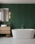 Hidden Understory dark green botanical wallpaper creating ambiance in a serene bathroom