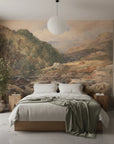 Hilltop Manor landscape mural wallpaper featuring mountain valley with earthy tones in modern bedroom setting