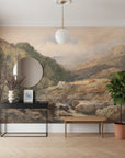 Hilltop Manor landscape mural wallpaper featuring painterly mountain valley scene in earth tones on entryway wall