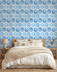 Hive Blue watercolor geometric peel and stick wallpaper in a warm and inviting living room