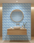 Hive Blue watercolor geometric peel and stick wallpaper adding character to a cozy bedroom