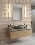 Honeycomb Drift beige and brown geometric hexagon tile wallpaper creating ambiance in a serene bathroom