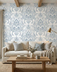 Honeyed Petal Mural dusty blue damask wallpaper in a warm and inviting living room