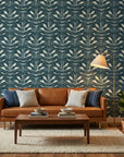 Indigo Vine blue foliage wallpaper in a warm and inviting living room