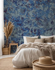 Abstract grunge self-adhesive wallpaper in textured indigo blue and purple tones, named Indigo Static