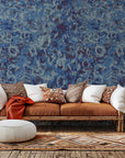 Self-adhesive wallpaper featuring a textured abstract grunge pattern in blue and purple, named Indigo Static