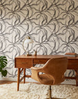 Ink Rivers black and grey abstract ink flow wallpaper as a feature wall in a bright home office
