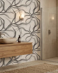 Ink Rivers black and grey abstract ink flow wallpaper creating ambiance in a serene bathroom