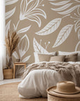 Peel and stick wallpaper featuring an elegant, silhouetted floral design in beige and white tones