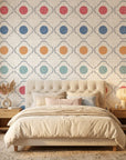 Multicolored Jade Trellis wallpaper with quatrefoil pattern and textured circles in modern bedroom setting