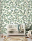 Green and cream Jade & Citron botanical leaf wallpaper in serene nursery setting