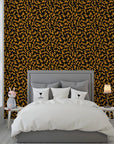 Bold black and vibrant orange zigzag patterns in a Memphis-style self-adhesive wallpaper - Jolt Maze