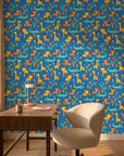 Jungle Bloom blue grid safari animal wallpaper as a feature wall in a bright home office