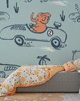 Blue illustrative safari creatures driving racecars peel and stick wall mural - Jungle Rumble